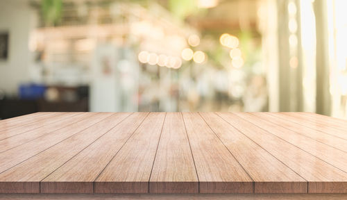 Close-up of empty bench on table