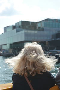 Rear view of woman with blond hair