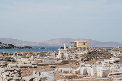 Ruins on the island of delos, greece, an archaeological site near mykonos in the cyclades.