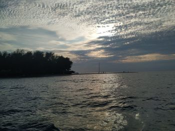 Scenic view of sea against sky at sunset