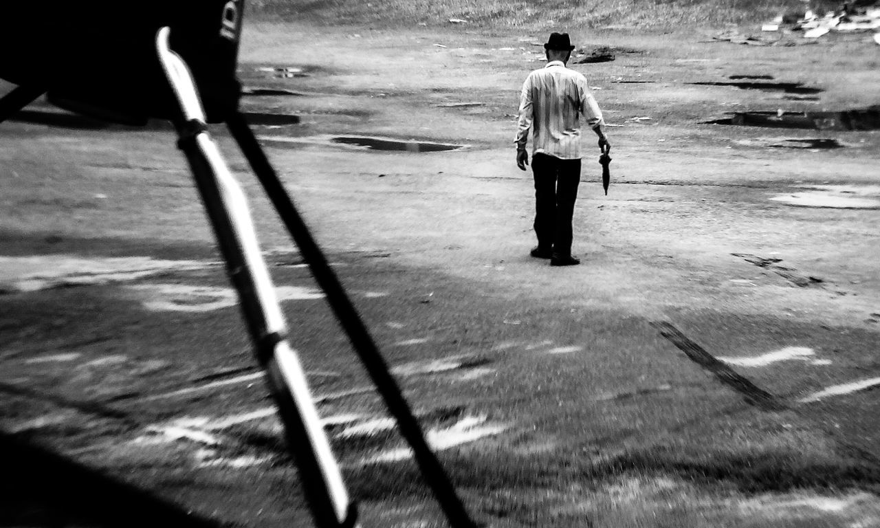 rear view, real people, men, lifestyles, full length, people, nature, day, walking, leisure activity, two people, sunlight, outdoors, shadow, city, street, motion, sport, standing, walking cane