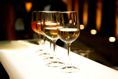 Close-up of wine in glass on table