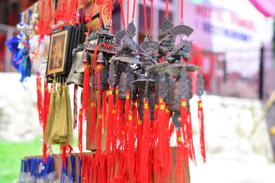 Souvenirs hanging at market stall