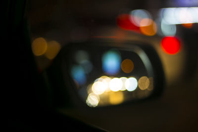Defocused image of lights in car