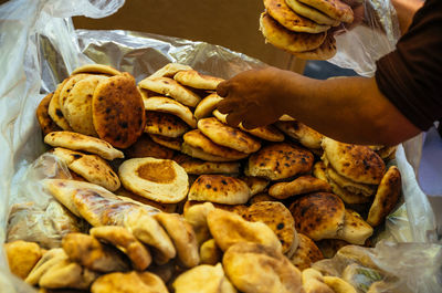Midsection of man preparing food