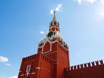 Low angle view of spasskaya tower against sky