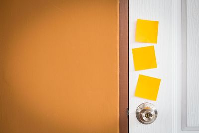 Blank adhesive notes on door