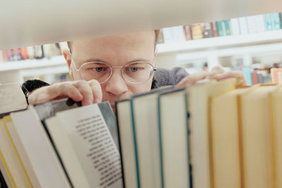 Portrait of woman reading book