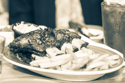 Close-up of bread in plate on table