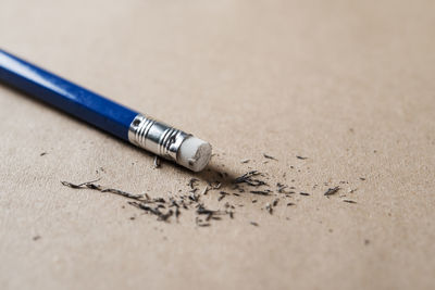 Close-up of pen on table