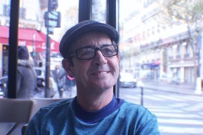 Smiling mature man looking away in city