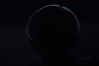 Close-up of moon over black background