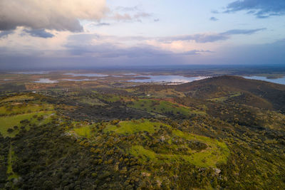 Alentejo drone aerial view of the landscape at sunset with alqueva dam reservoir, in portugal