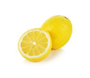 Close-up of lemon against white background