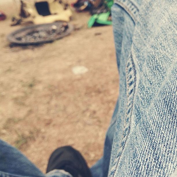 low section, person, shoe, personal perspective, part of, human foot, unrecognizable person, close-up, lifestyles, men, footwear, jeans, focus on foreground, leisure activity, high angle view, selective focus, cropped