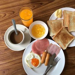 High angle view of breakfast served on table