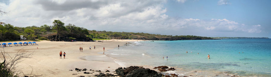 Tourists enjoying on beach