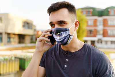 Portrait of a young man wearing sunglasses