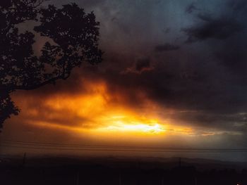 Scenic view of dramatic sky during sunset