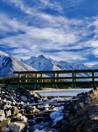 Scenic view of lake against sky during winter