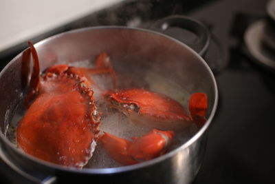 High angle view of meat in cooking pan