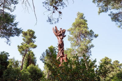 Low angle view of statue against clear sky