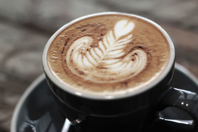 Close-up of cappuccino on table