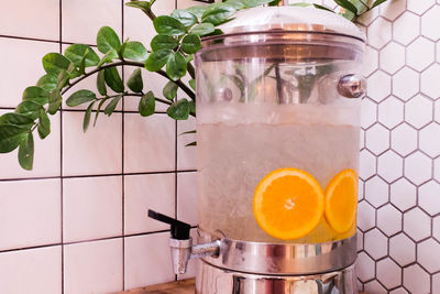 Fruits in glass jar on table at home