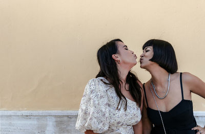 Portrait of two beautiful happy young women