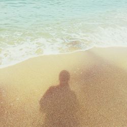 High angle view of shadow on beach