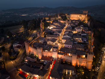 High angle view of illuminated buildings in city