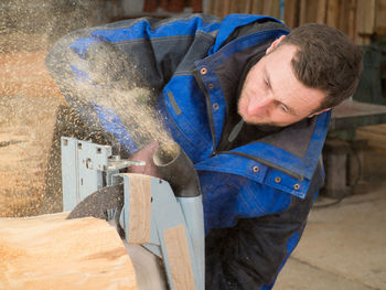 Man working on wood