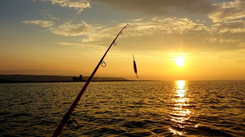 Scenic view of sea at sunset