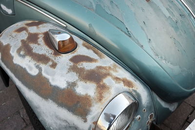 Close-up of old car headlight