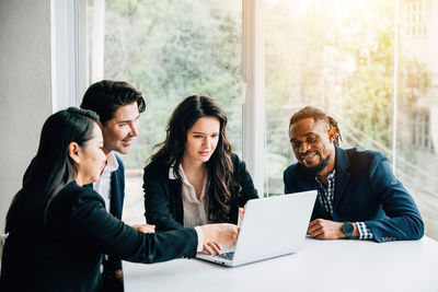 Business colleagues working at office