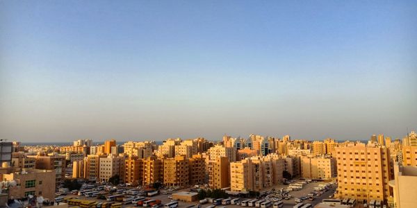 High angle view of buildings against clear sky