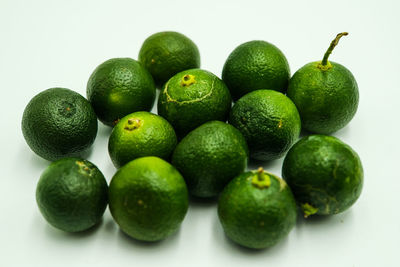 Close-up of green fruits in plate