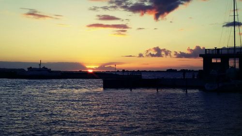 Scenic view of sea at sunset