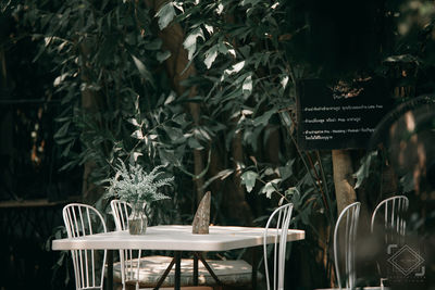 Empty chairs and tables in restaurant