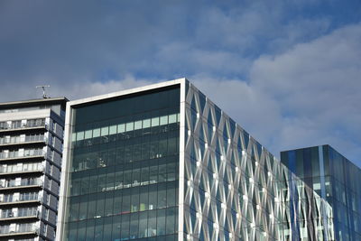 Low angle view of modern building against sky