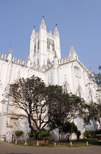 Low angle view of building against blue sky