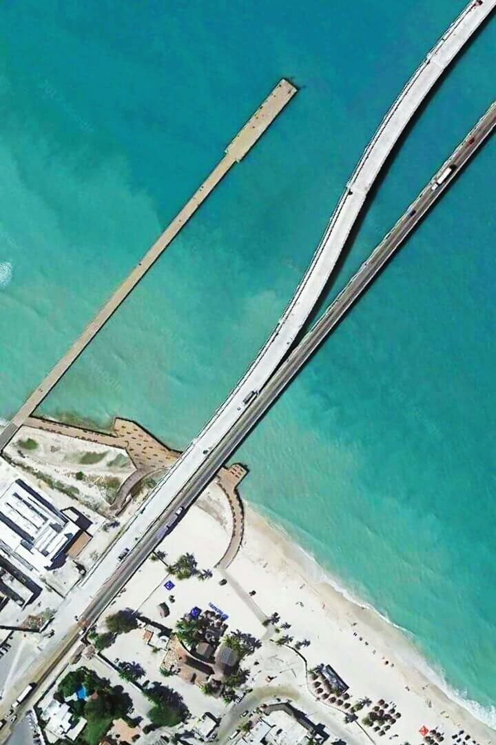 HIGH ANGLE VIEW OF SHIP IN SEA