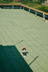 High angle view of people walking on road