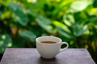 Close-up of coffee cup on table