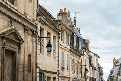 Low angle view of buildings against sky