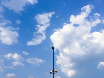 Low angle view of street light against sky