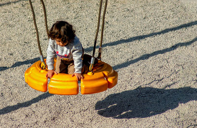 High angle view of boy playing on playground