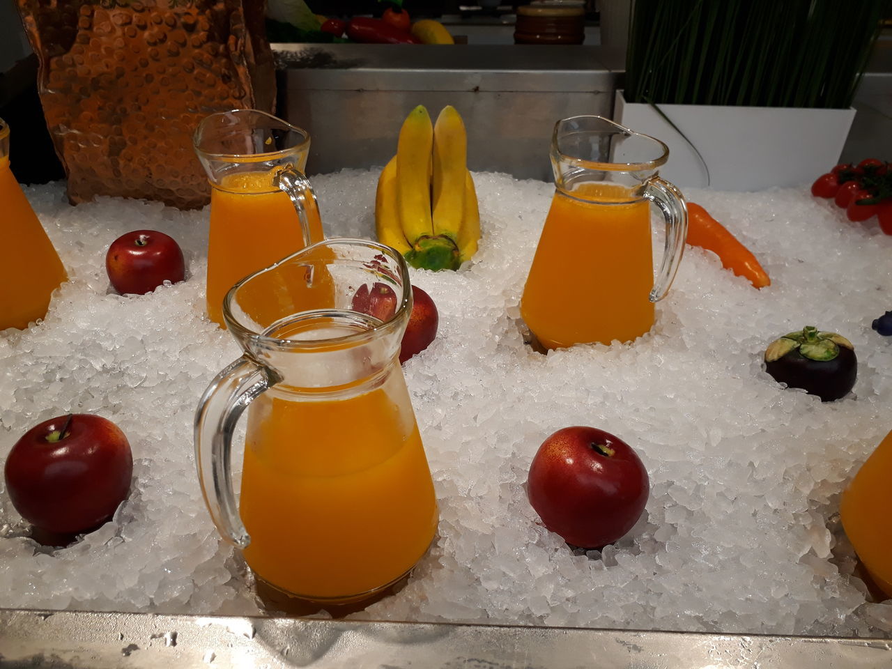 FRUITS IN GLASS JAR ON TABLE AT HOME