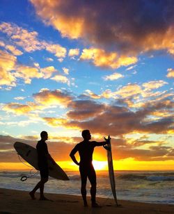 Scenic view of sea at sunset