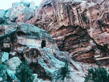 Low angle view of rocks on mountain